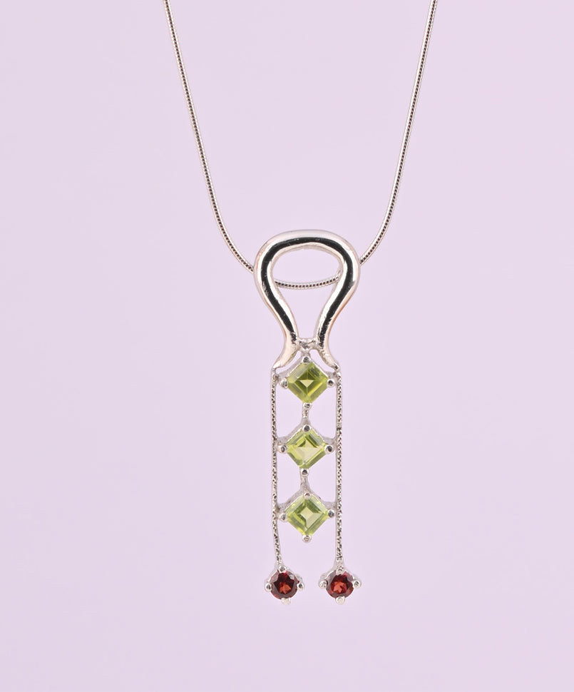 6.22/GM PERIDOT/GARNET (1650)