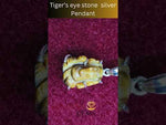 Load and play video in Gallery viewer, Silver Pendant of Natural Tiger (Ganesha) Stone-1200
