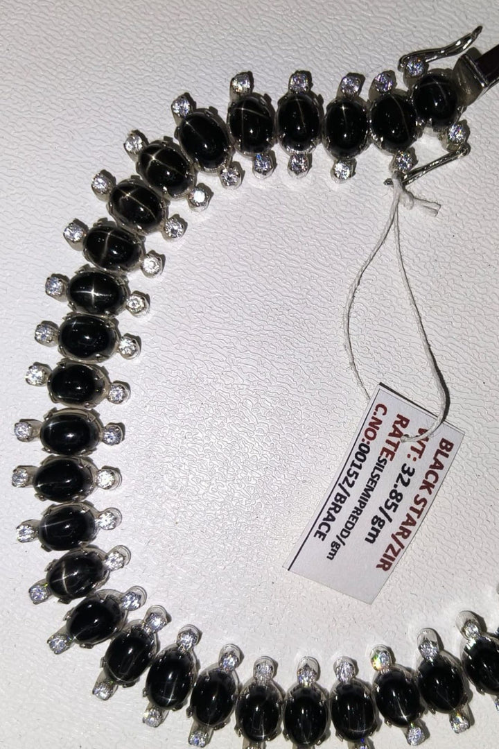 32.85/GM BLACK STAR (1650)