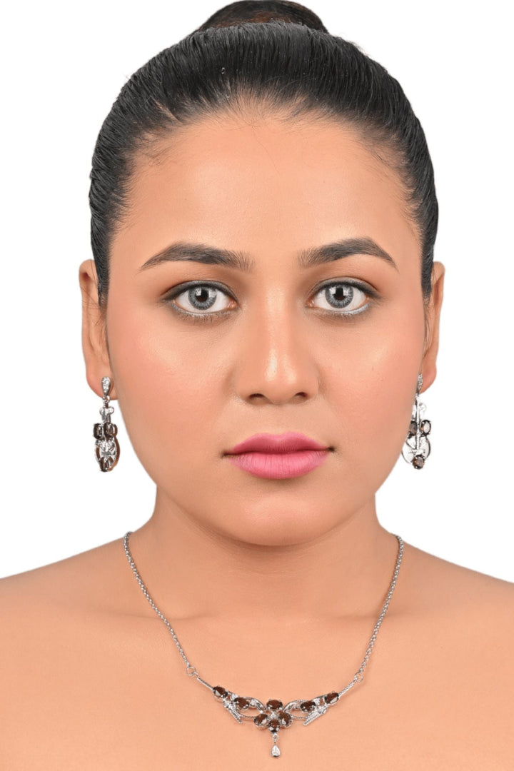 24.30/GM SMOKY TOPAZ/ZIRCON (1650)