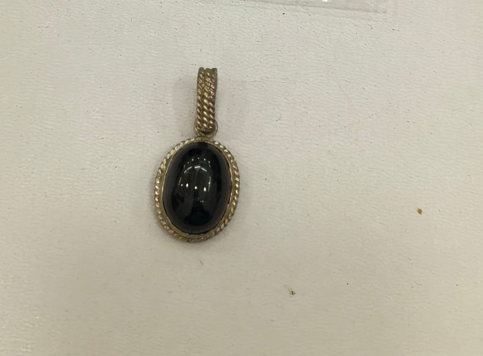 10.60/GM BLACK STAR SILVER PENDANT (525.00)