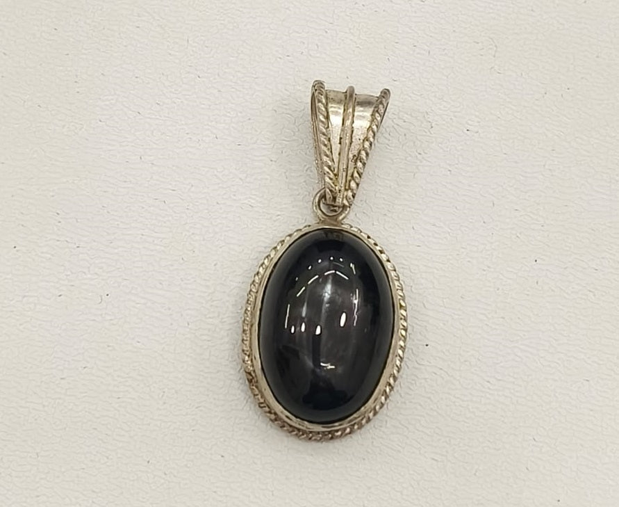 16.30/GM BLACK STAR SILVER  PENDANT  (525.00)