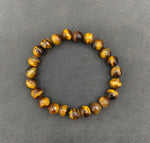 Load image into Gallery viewer, TIGER EYE FACETED BRACELET